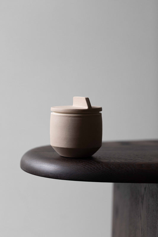 Small Container, Sand, by Derek Wilson