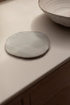 Grey Plates by Lisa Stockham