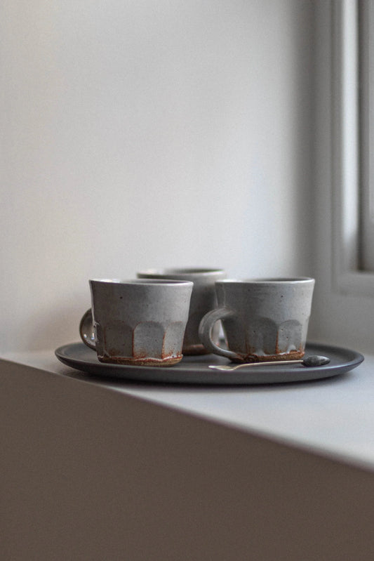 Shino Faceted Mugs by Tim Lake