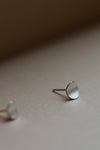 Circle Stud Earrings in Silver by Kei Tominaga