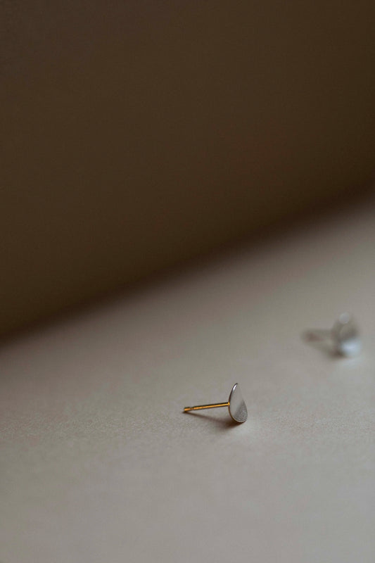 Circle Stud Earrings in Silver by Kei Tominaga