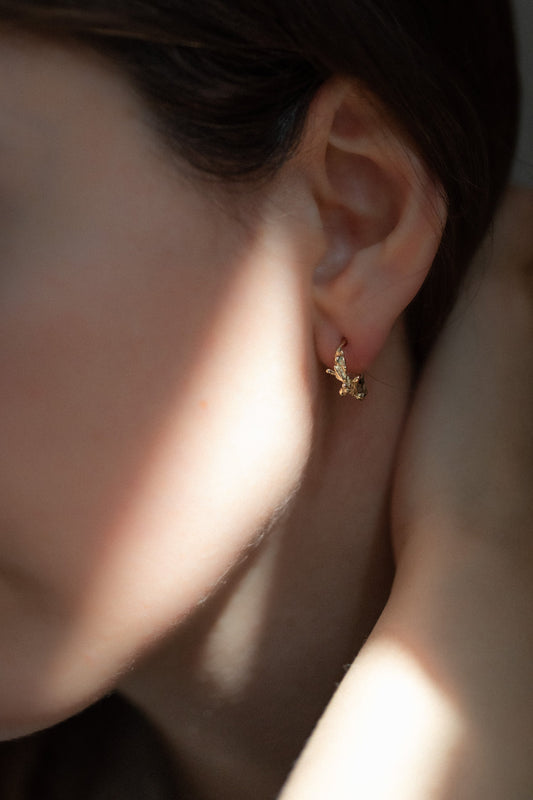 Minima golden Hoops' by Laura Ngyou