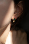 Molten Emerald Earrings' by Laura Ngyou