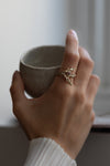 Porphyra Sapphire and diamond ring' by Laura Ngyou