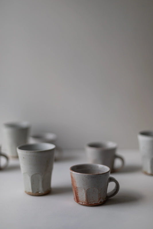 Shino Faceted Mugs by Tim Lake