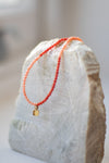 Shell square coral necklace by Ulrike Ramin