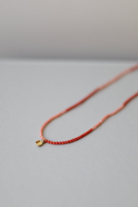 Shell square coral necklace by Ulrike Ramin