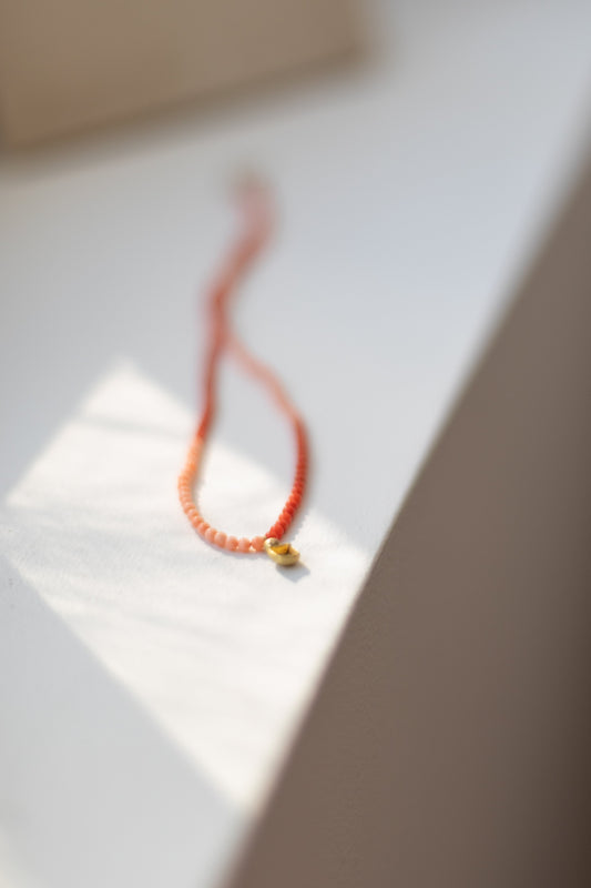 Shell square coral necklace by Ulrike Ramin