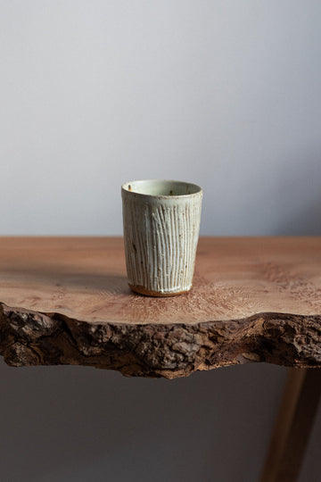Vertically Combed Beakers