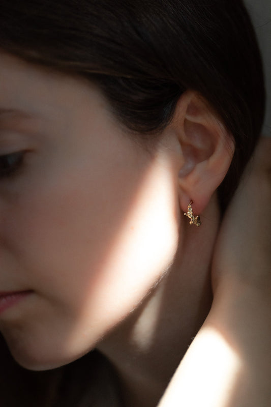 Minima golden Hoops' by Laura Ngyou