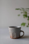 Shino Faceted Mugs by Tim Lake